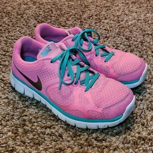 pink Nike running shoes - size 7